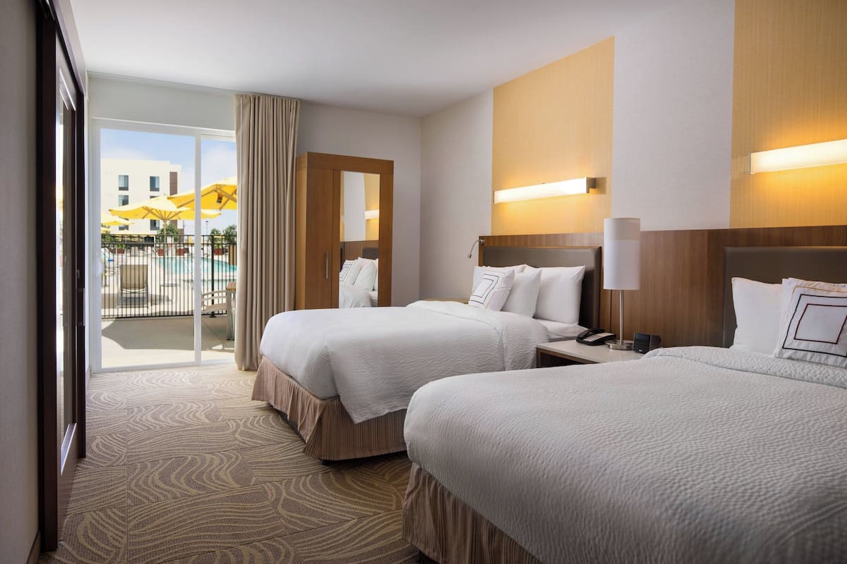 studio, multiple beds, non smoking, poolside | pool | outdoor pool