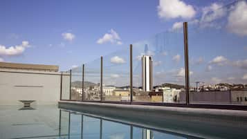 Seasonal outdoor pool, open 10:00 AM to 8:00 PM, sun loungers