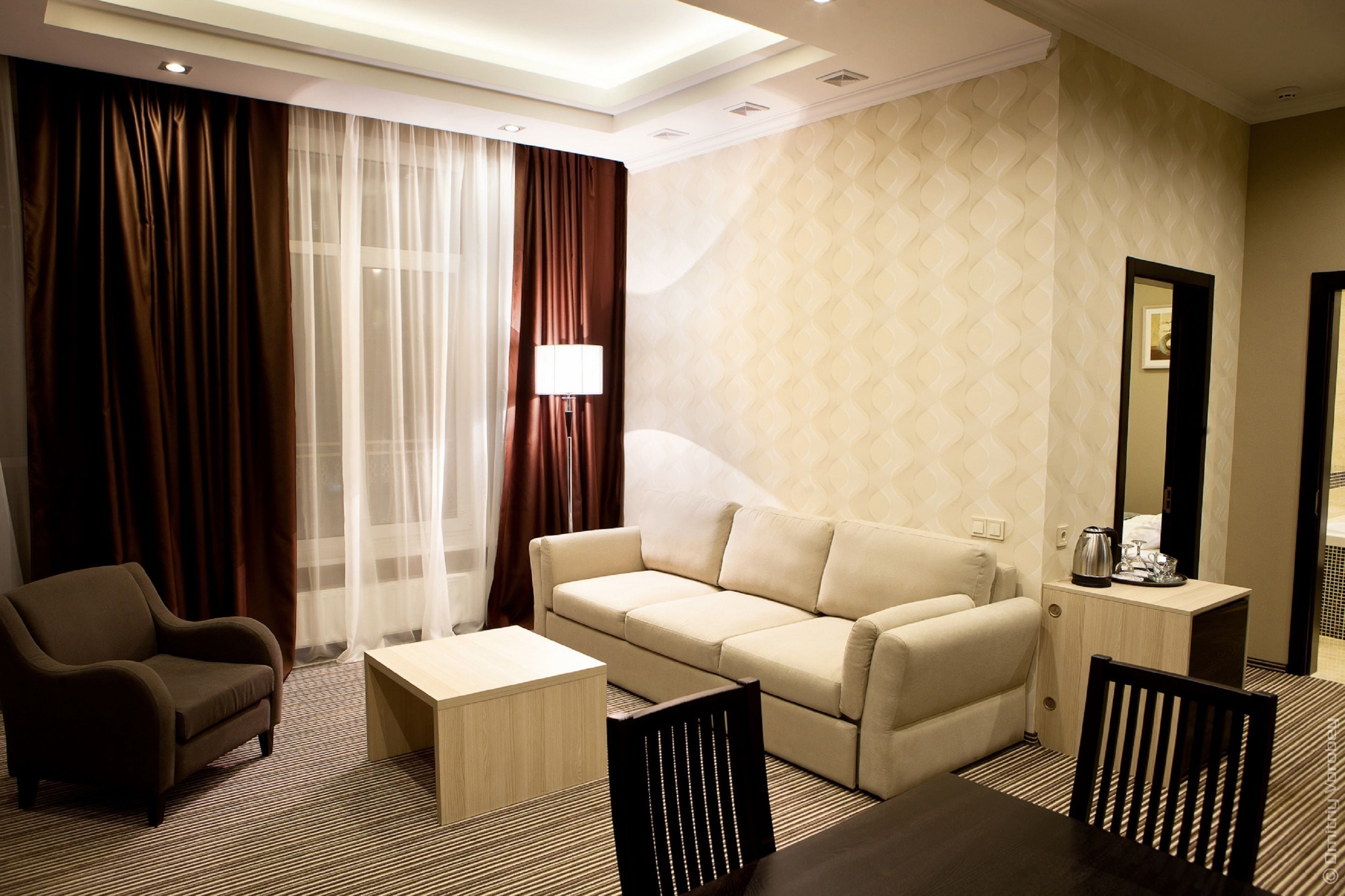 Suite Deluxe | Area soggiorno | TV a schermo piatto