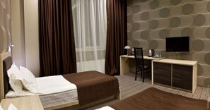 Ropa de cama de alta calidad y minibar 