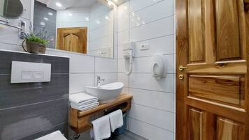 Shower, free toiletries, hair dryer, towels