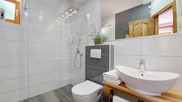 Shower, free toiletries, hair dryer, towels