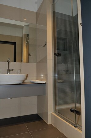 Shower, free toiletries, hair dryer, towels