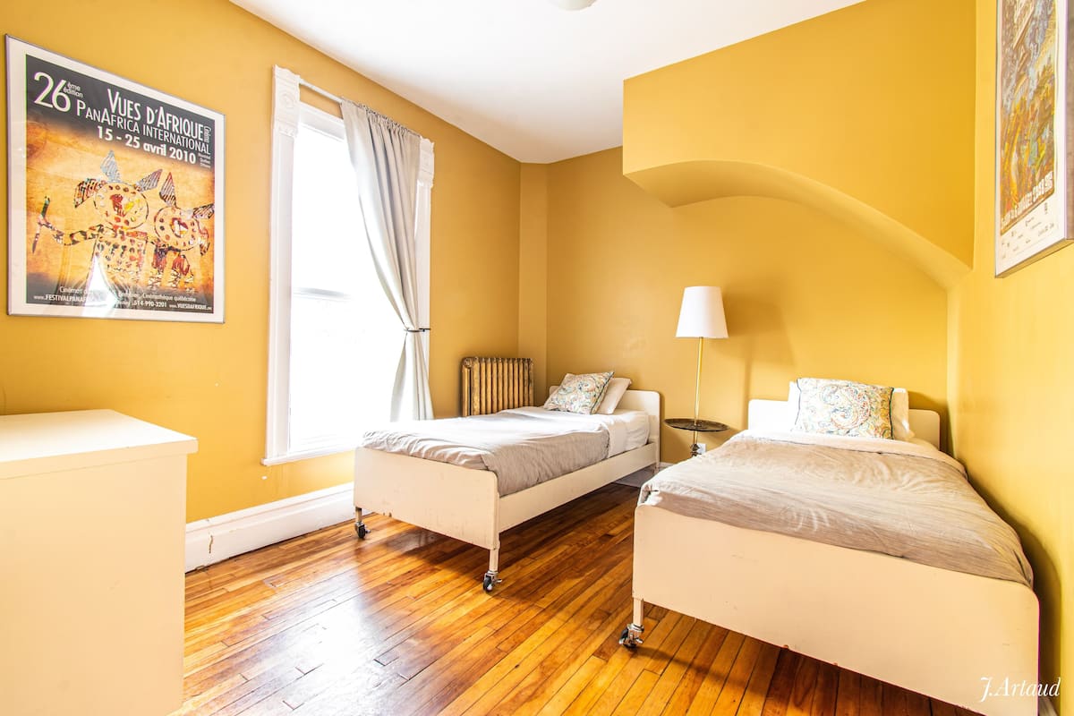 Premium bedding, desk, laptop workspace, soundproofing