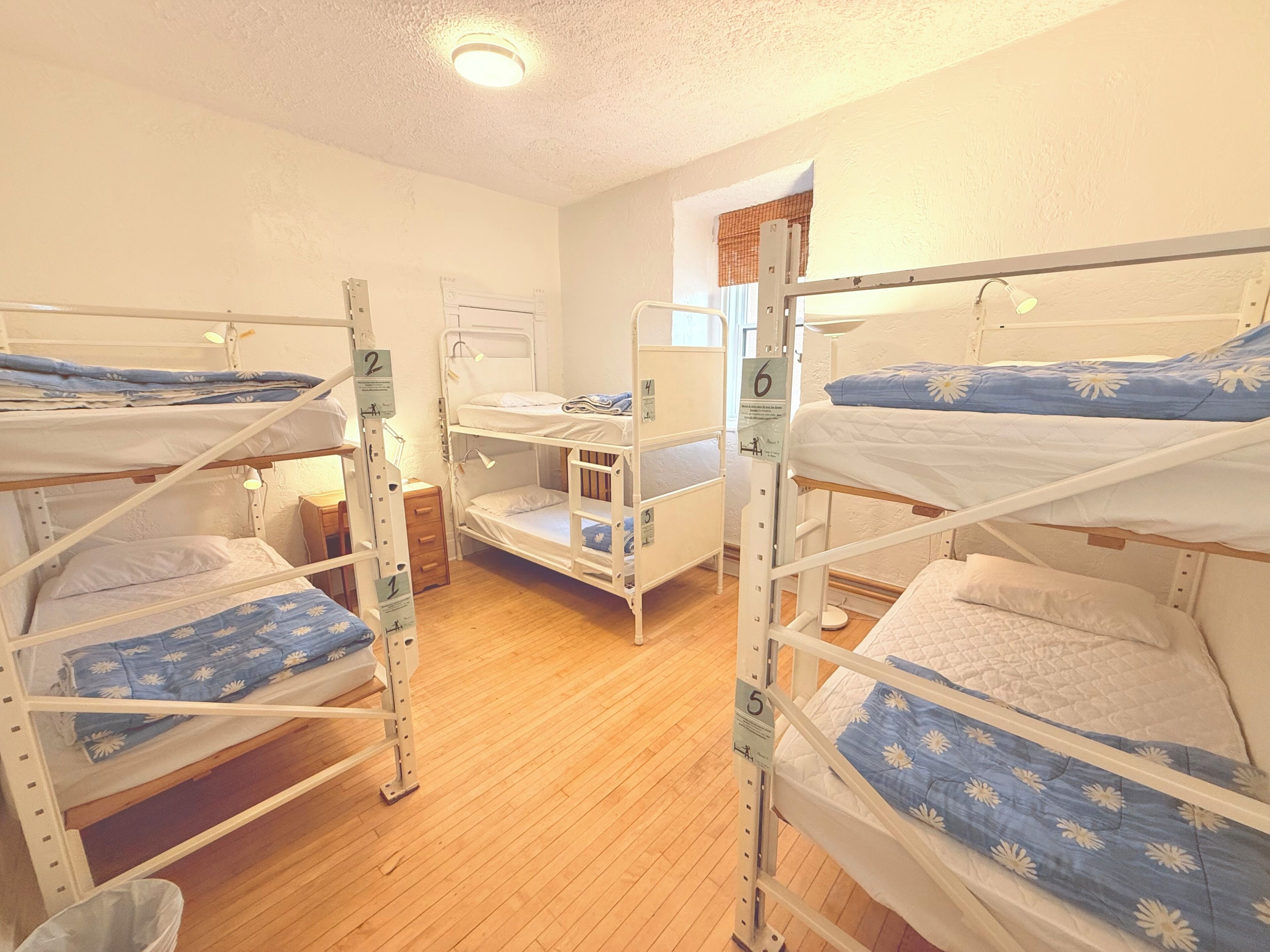 Premium bedding, desk, laptop workspace, soundproofing