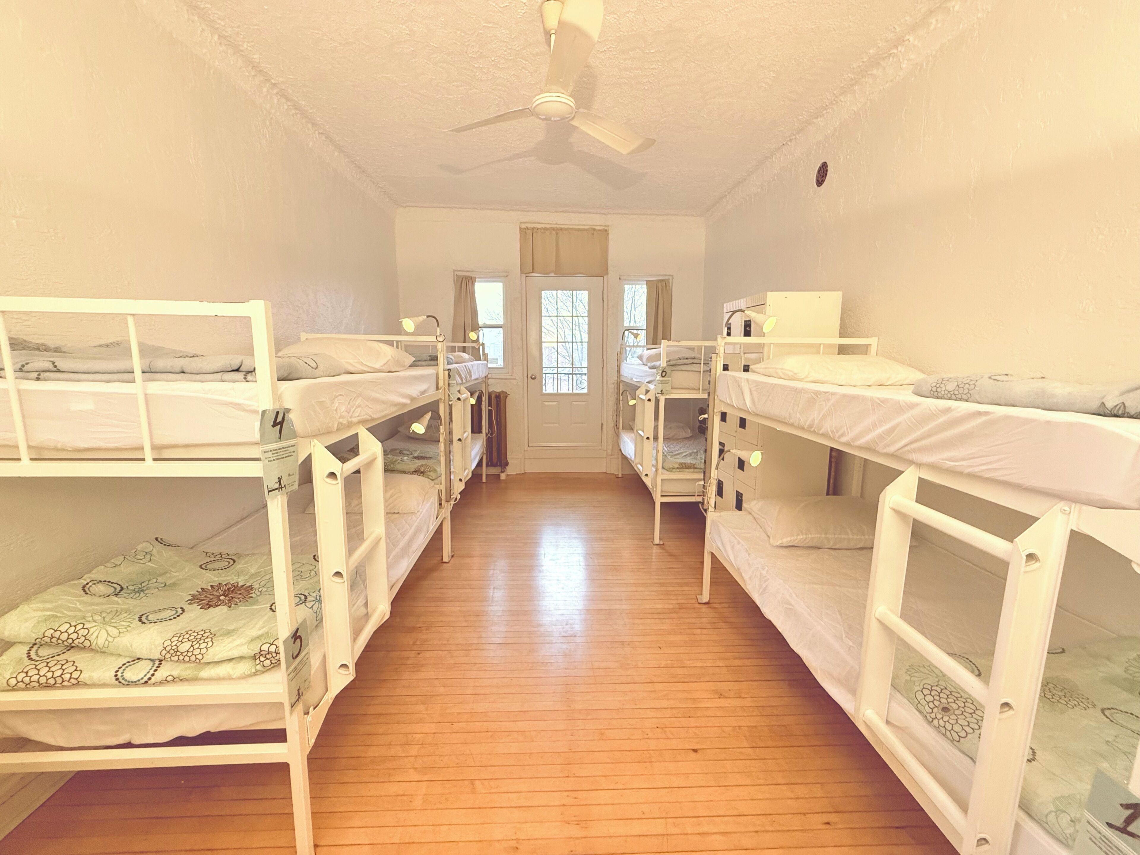 Premium bedding, desk, laptop workspace, soundproofing