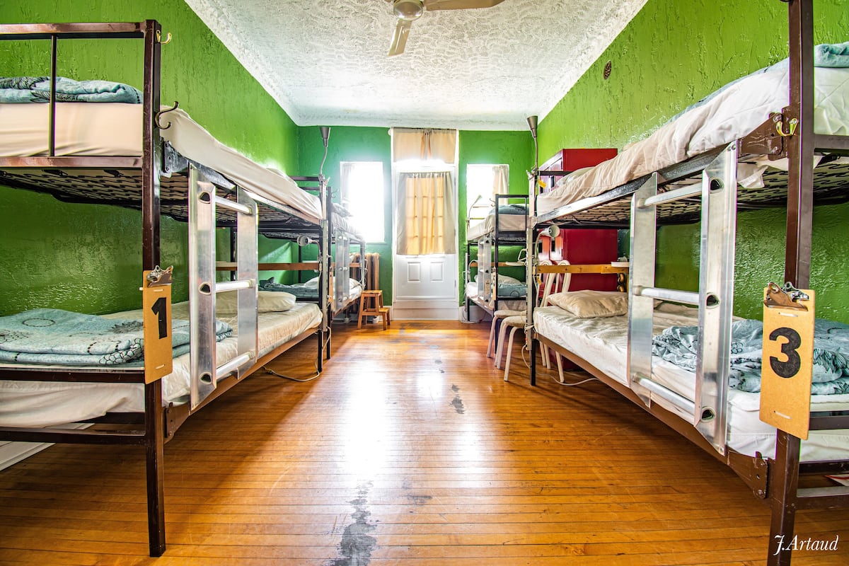 Premium bedding, desk, laptop workspace, soundproofing