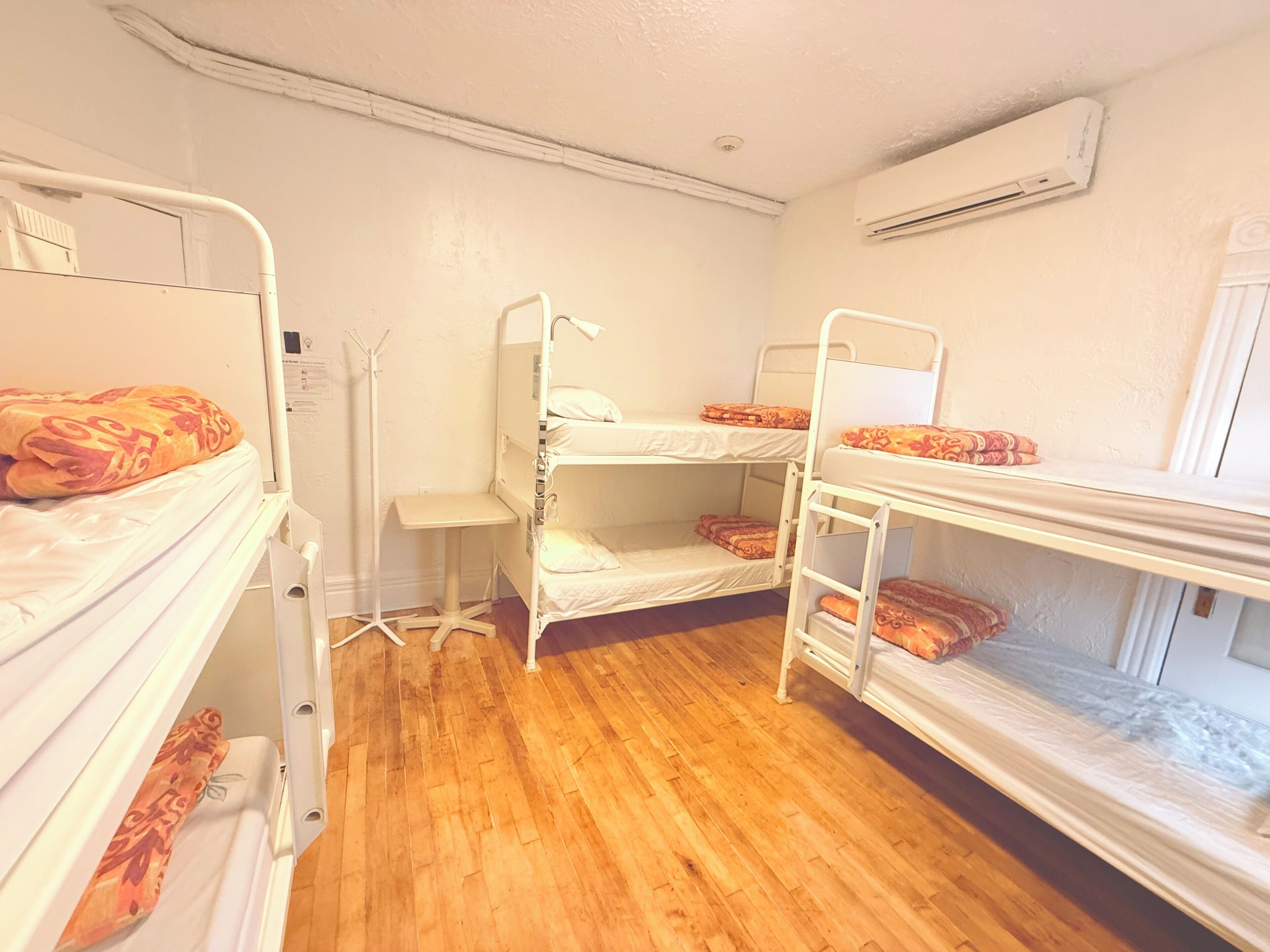 Premium bedding, desk, laptop workspace, soundproofing