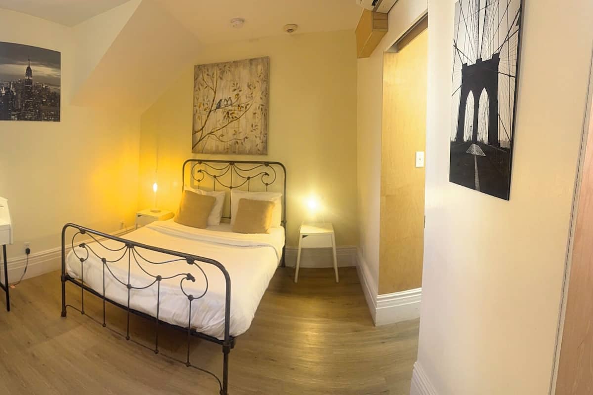 Economy Double Room with Private Bathroom Semi-Basement | Premium bedding, desk, laptop workspace, soundproofing