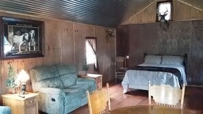 Traditional Cabin, 2 Queen Beds, Refrigerator & Microwave Without Indoor Plumbing | Living area | LCD TV