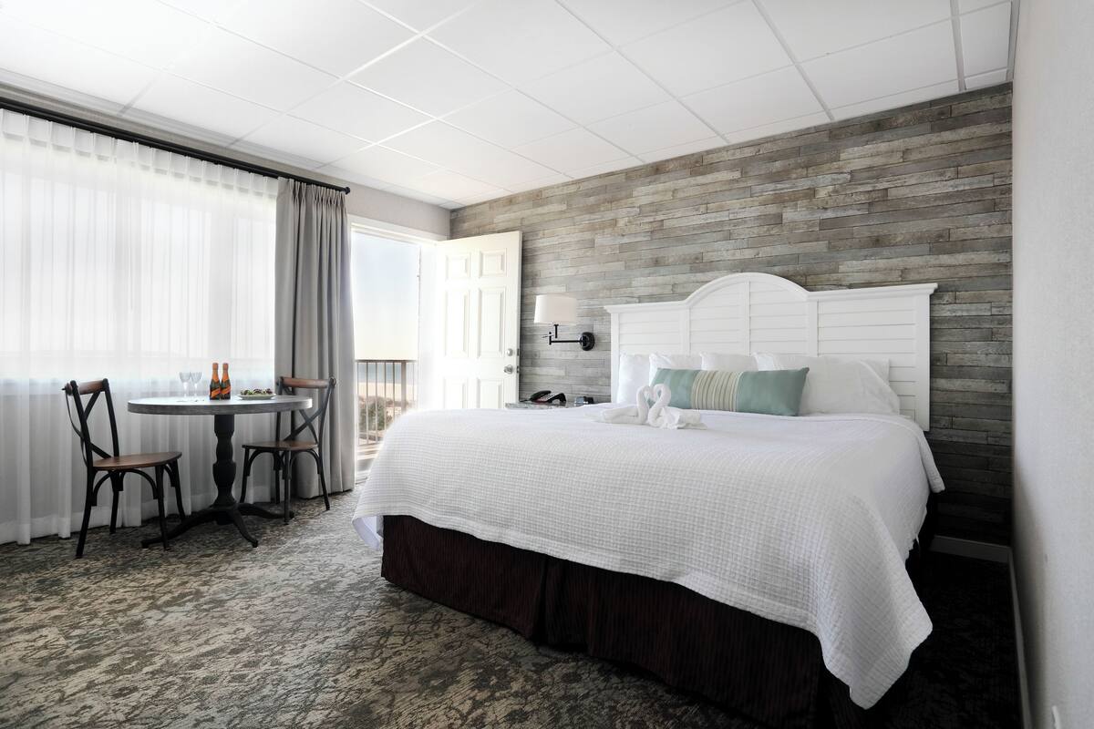 1 king bed with sofa bed, side ocean view | premium bedding, pillow-top beds, in-room safe, blackout curtains