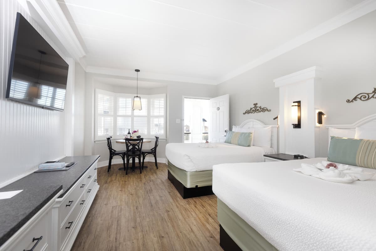 2 Double Beds, Kitchenette, Pool View, Ground Floor Exterior Entrance | Premium bedding, pillowtop beds, in-room safe, blackout drapes