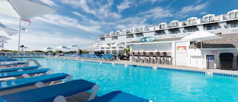 Indoor pool, seasonal outdoor pool, pool umbrellas, pool loungers
