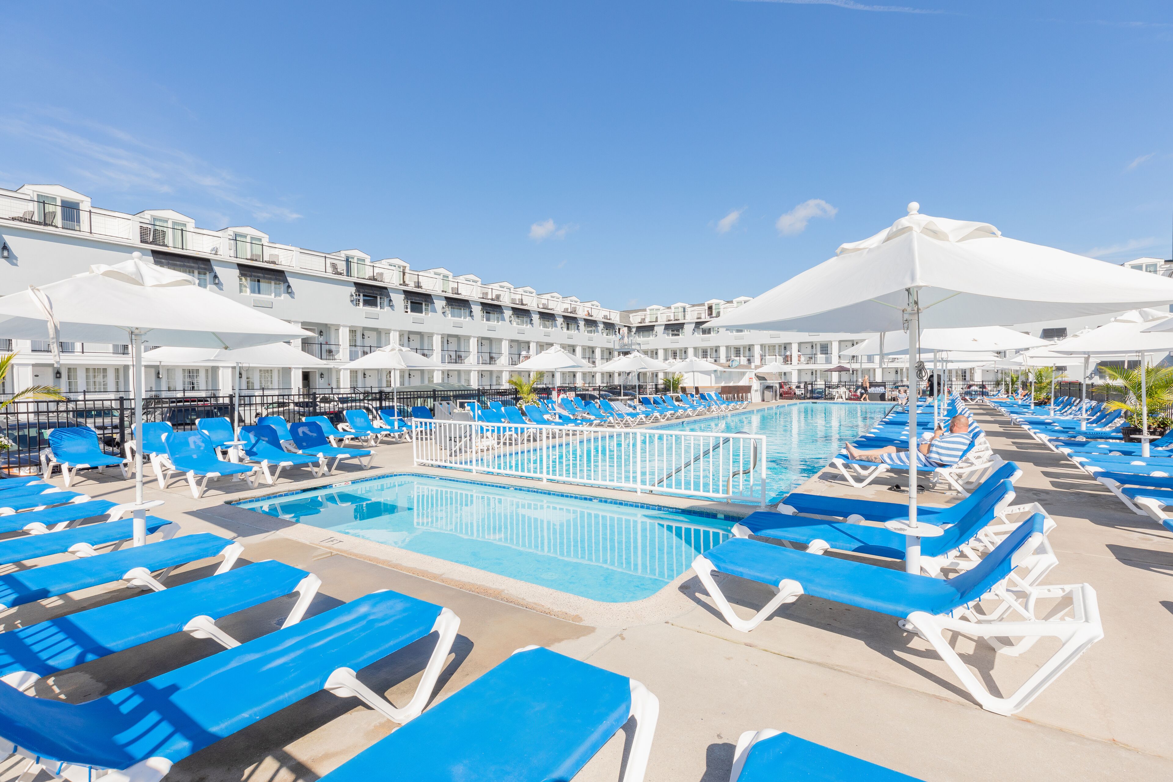 indoor pool, seasonal outdoor pool, pool umbrellas, pool loungers