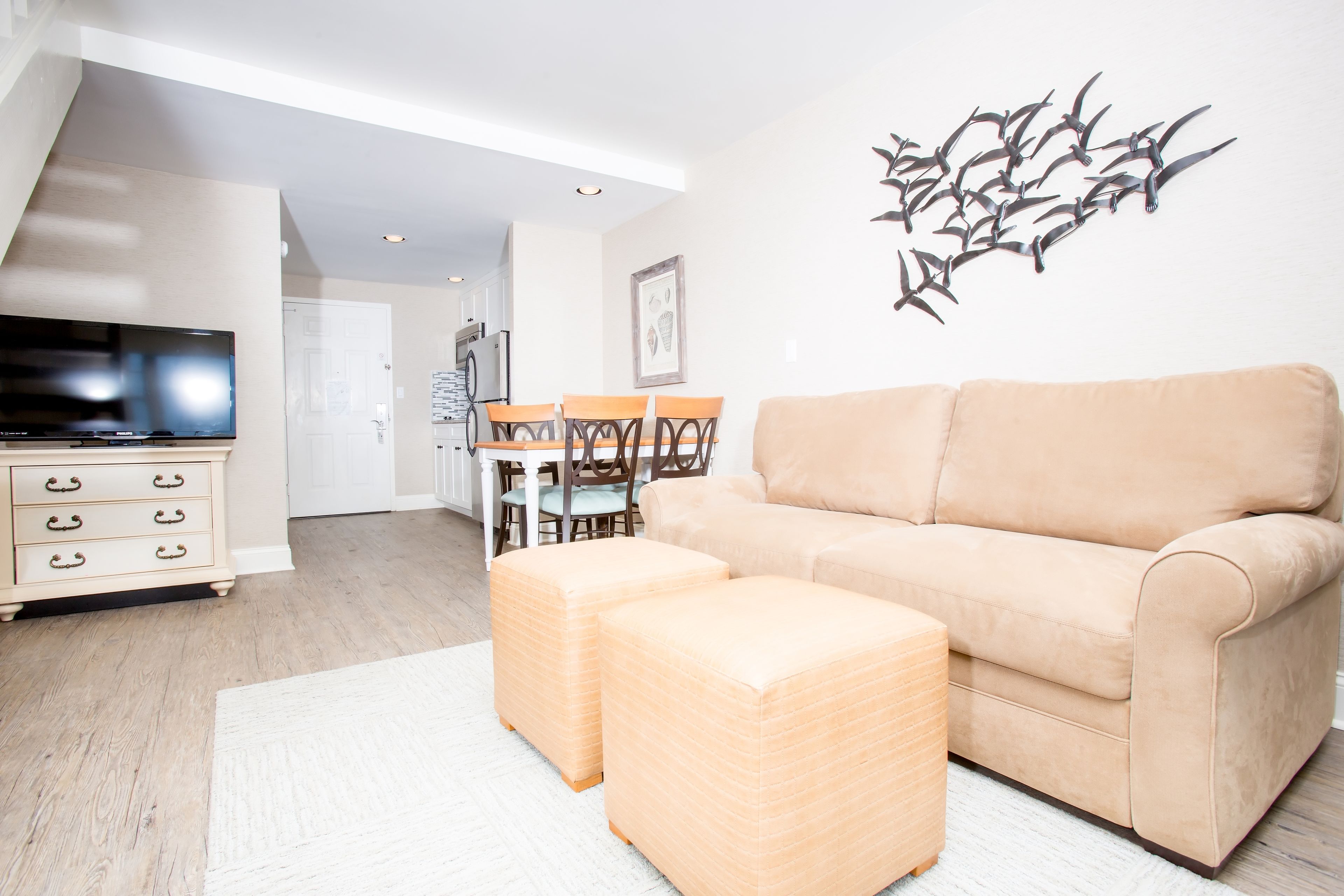 Bi-level Townhouse Suite, 2 Queen Beds with Sofa Bed, Kitchenette, Ocean & Pool View | Premium bedding, pillowtop beds, in-room safe, blackout drapes