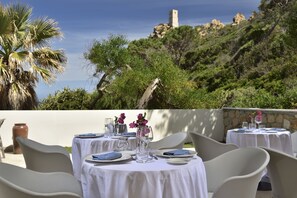 Breakfast, lunch, dinner served; beach views