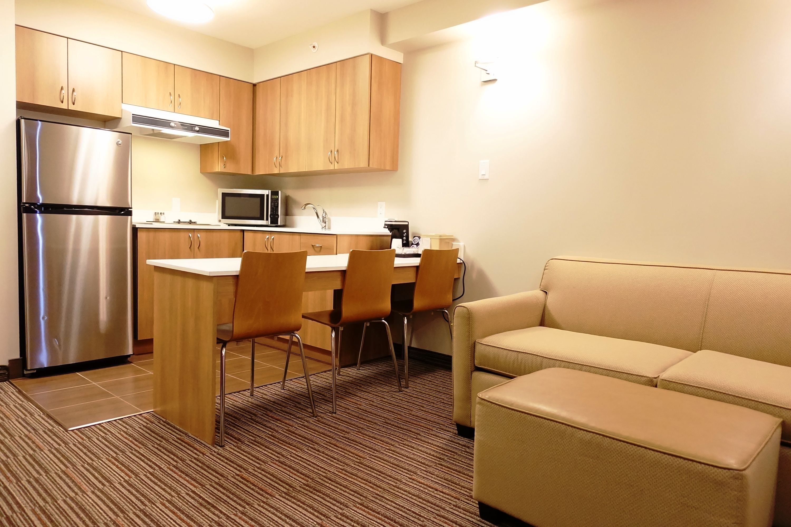 suite, 1 bedroom, non smoking, kitchenette | in-room safe, desk, laptop workspace, soundproofing