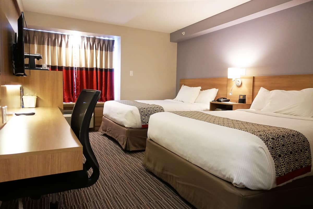 Room, 2 Queen Beds, Non Smoking | In-room safe, desk, laptop workspace, soundproofing