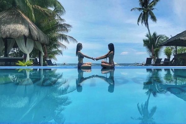 Outdoor pool, pool umbrellas, pool loungers