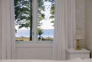 Quarto casal, banheiro privativo, vista para o oceano | Individualmente decorados, ferros/tábuas de passar roupa