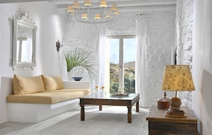 Hermes Grande Suite with Sea View | Living area | 40-inch TV with satellite channels