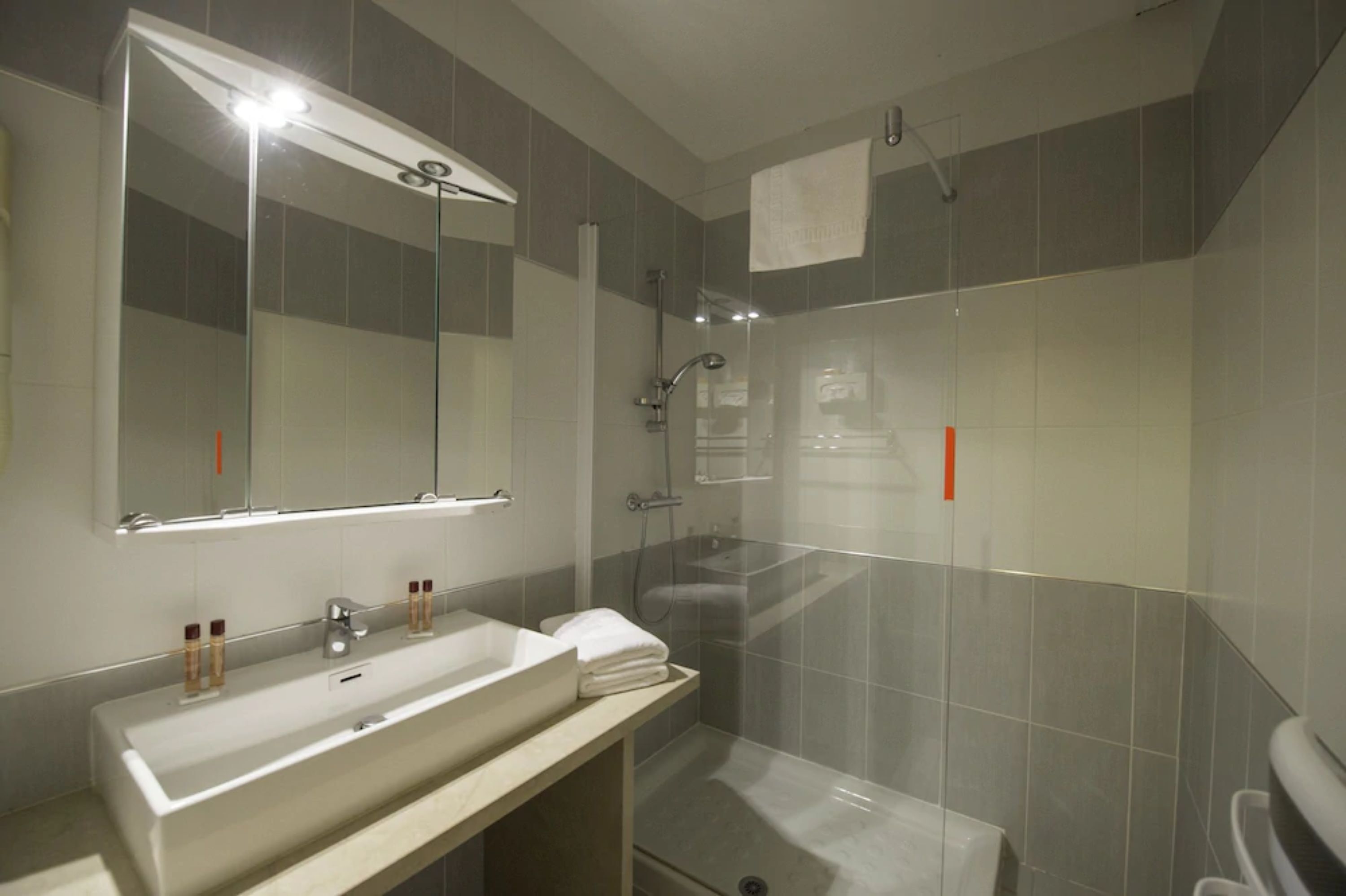 free toiletries, hair dryer, slippers, towels