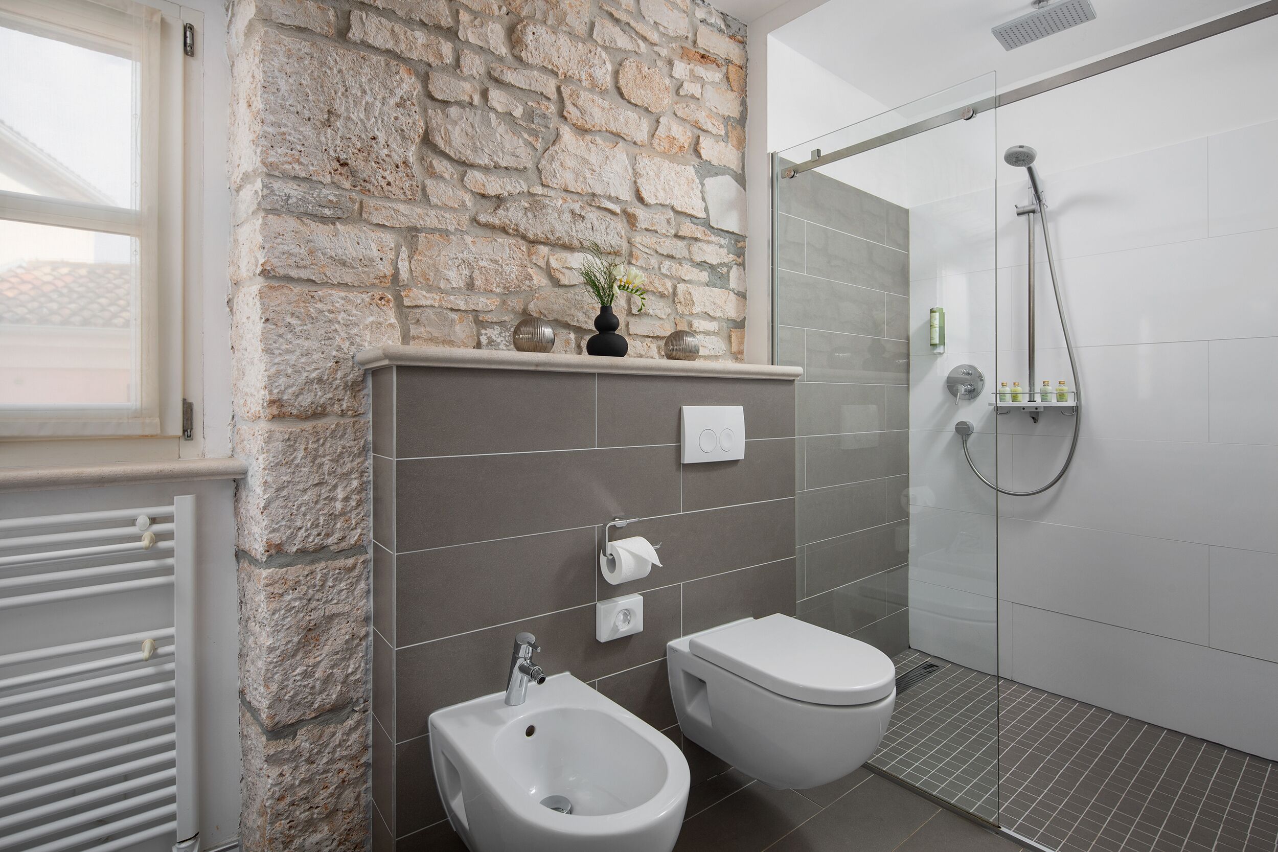 standard double room | bathroom | designer toiletries, hair dryer, bathrobes, slippers