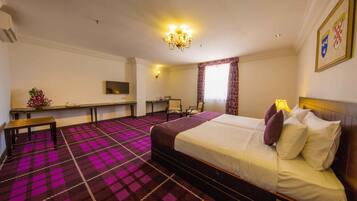 Premium Room, City View - Early check-in or late check-out subject to availability | 1 bedroom, minibar, in-room safe, desk