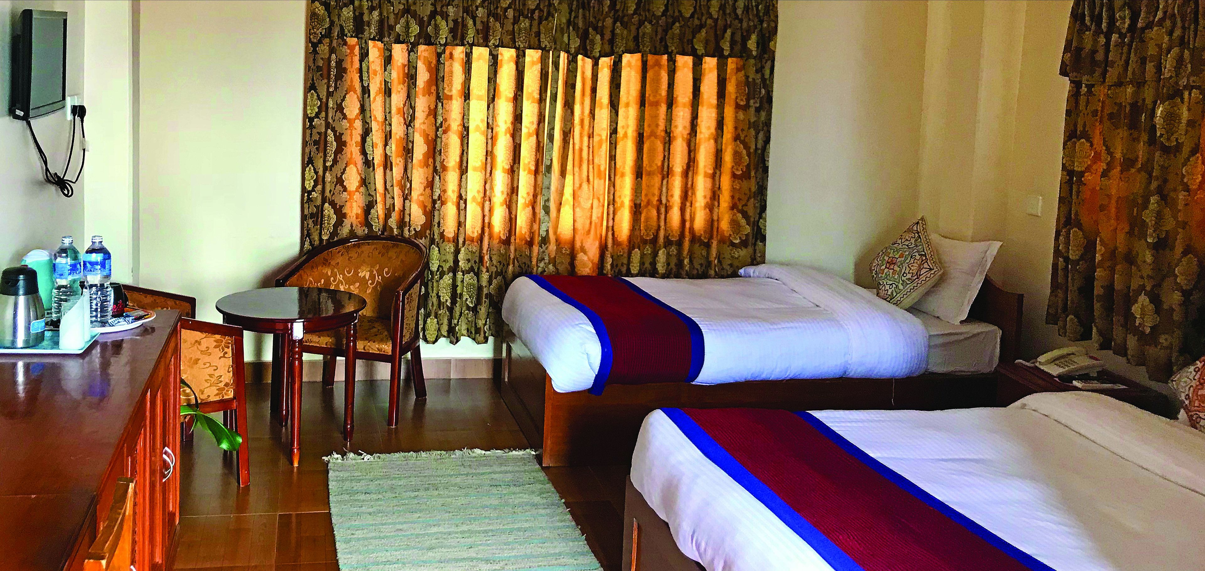 Deluxe Room | Desk, iron/ironing board (on request), WiFi (free), bed sheets