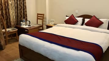 Deluxe Room | In-room safe, desk, iron/ironing board, cribs/infant beds
