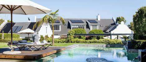2 outdoor pools, pool umbrellas, pool loungers
