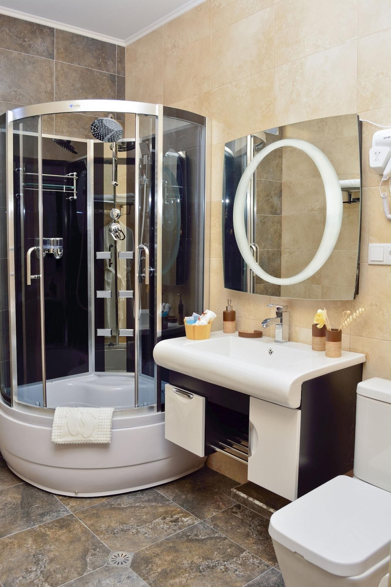 family room | bathroom | shower, free toiletries, hair dryer, bathrobes