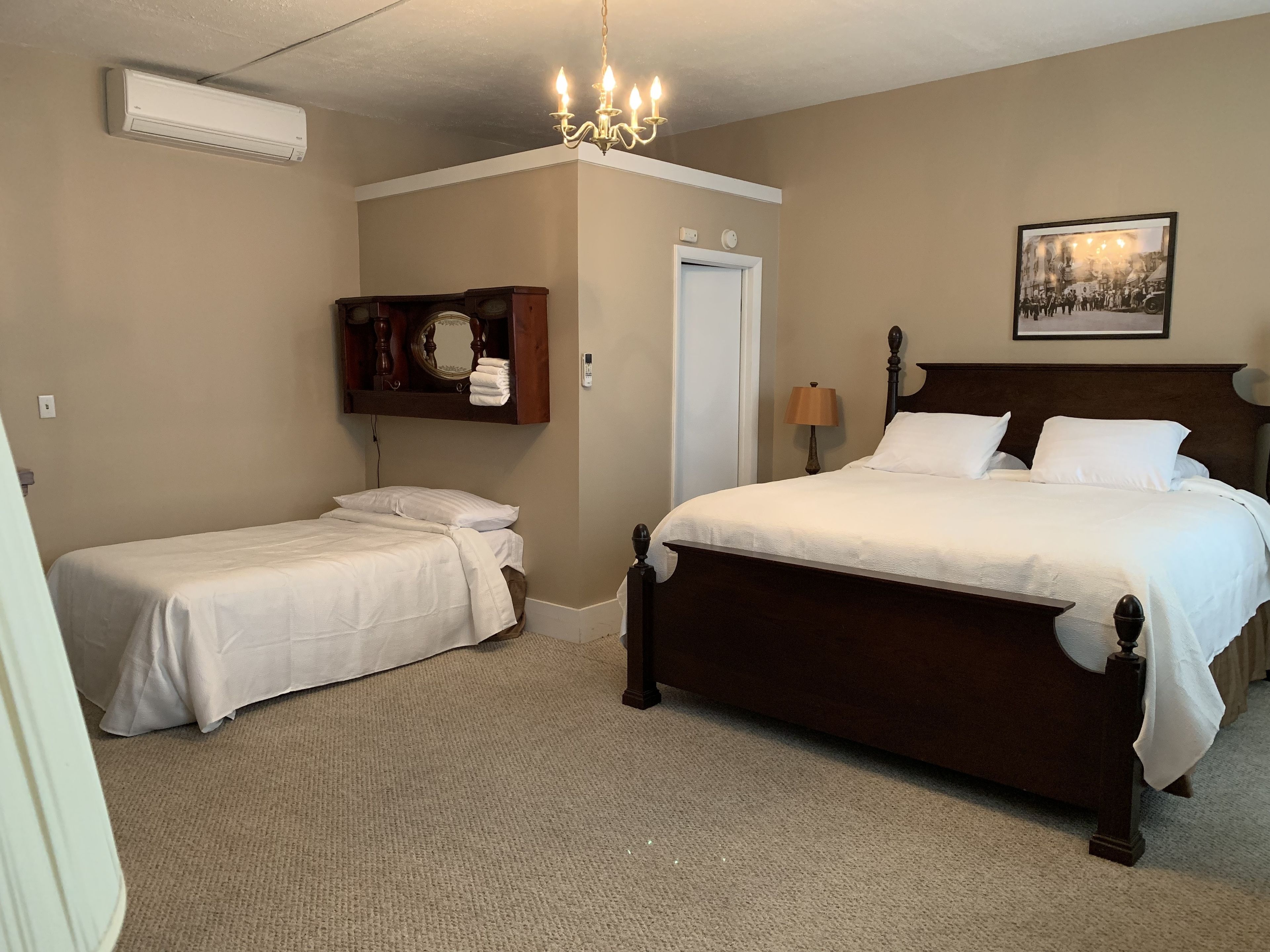 comfort room (room #7) | iron/ironing board, bed sheets