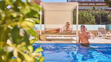 Outdoor pool, open 10:00 AM to 7:00 PM, pool umbrellas, sun loungers