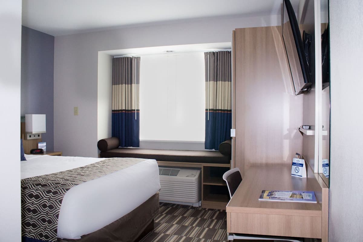 Premium bedding, down comforters, pillowtop beds, in-room safe