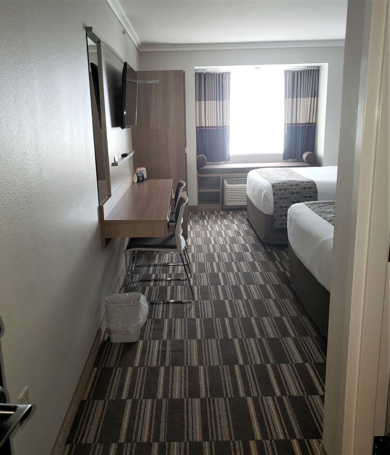 Premium bedding, down comforters, pillowtop beds, in-room safe