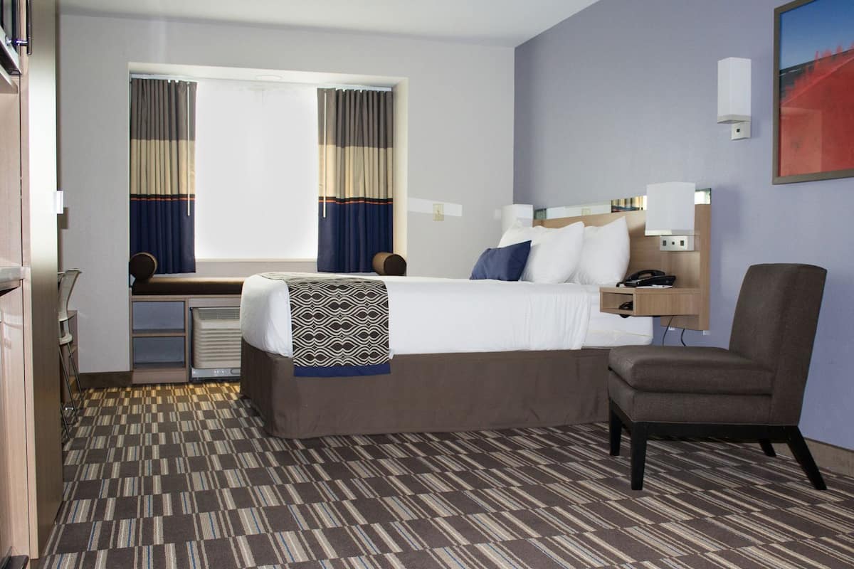 Premium bedding, down comforters, pillowtop beds, in-room safe