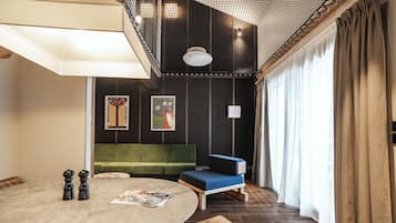 Appartement Marie - Maison Lyret | Living area | 43-inch flat-screen TV with satellite channels, TV, DVD player