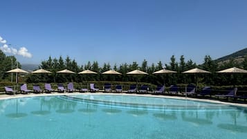 Indoor pool, seasonal outdoor pool, open noon to 9:00 PM, sun loungers