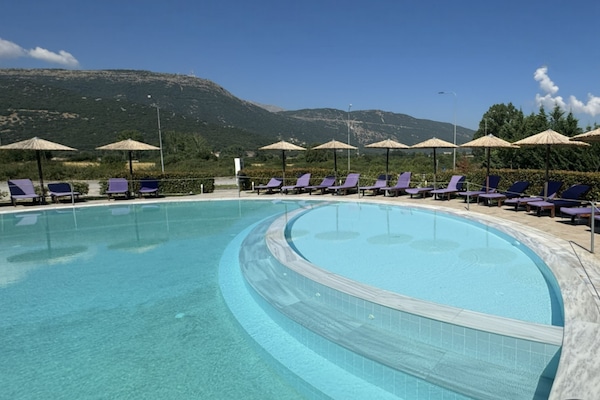 Indoor pool, seasonal outdoor pool, open noon to 9:00 PM, sun loungers