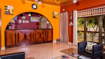 Standard Twin Room | Living area | Flat-screen TV