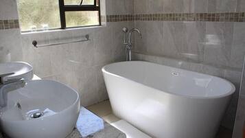 Hair dryer, towels, soap, shampoo