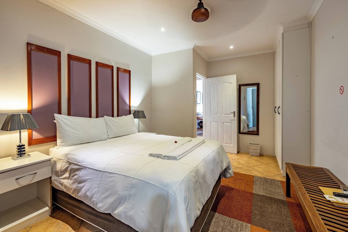 Standard House | Premium bedding, in-room safe, laptop workspace, WiFi (free)