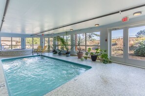 Indoor pool, open 10:00 AM to 9:00 PM, pool loungers