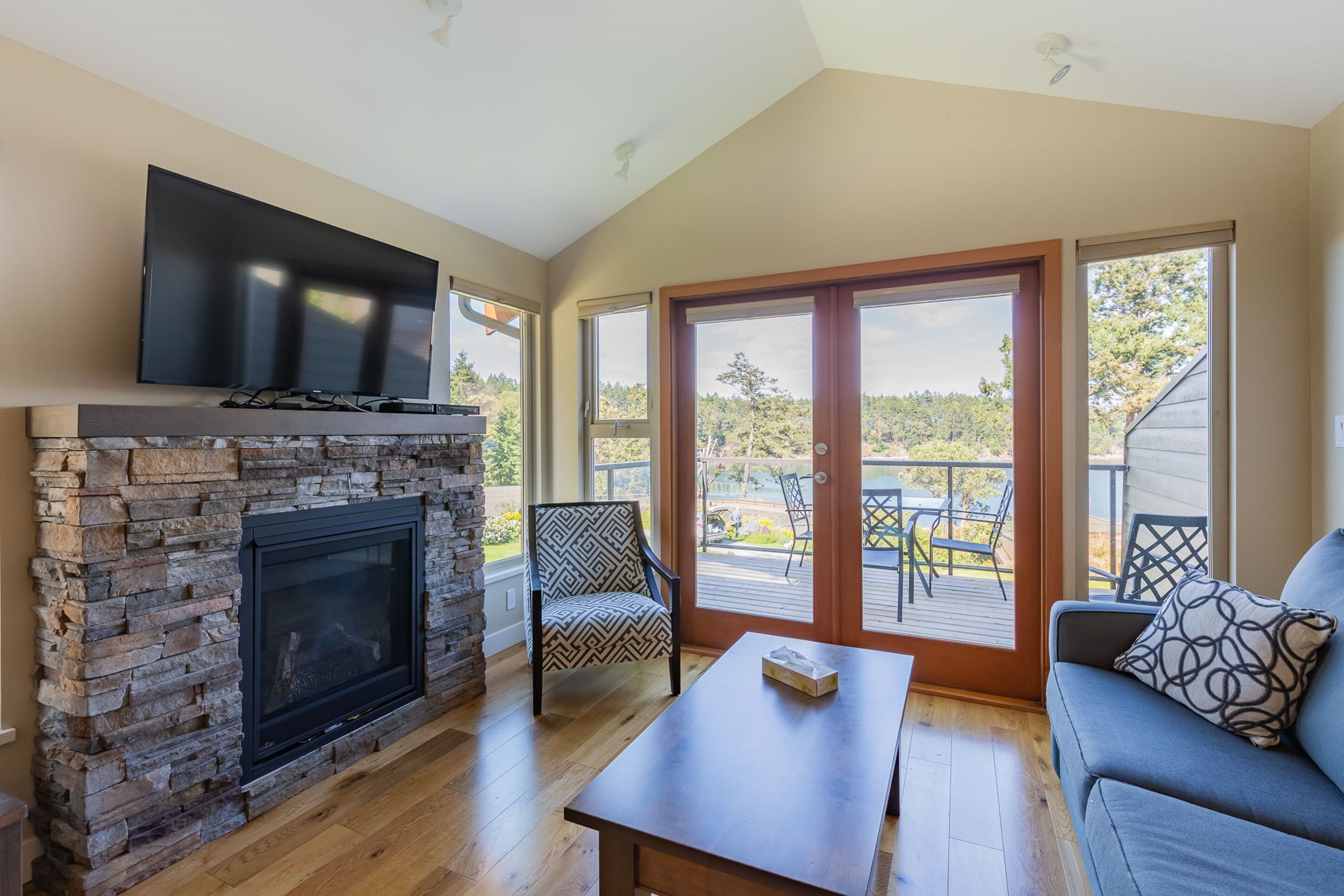 deluxe villa, 2 bedrooms, kitchen, ocean view | living area | flat-screen tv