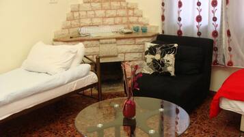 Familien-Suite | Wohnbereich | Flachbildfernseher