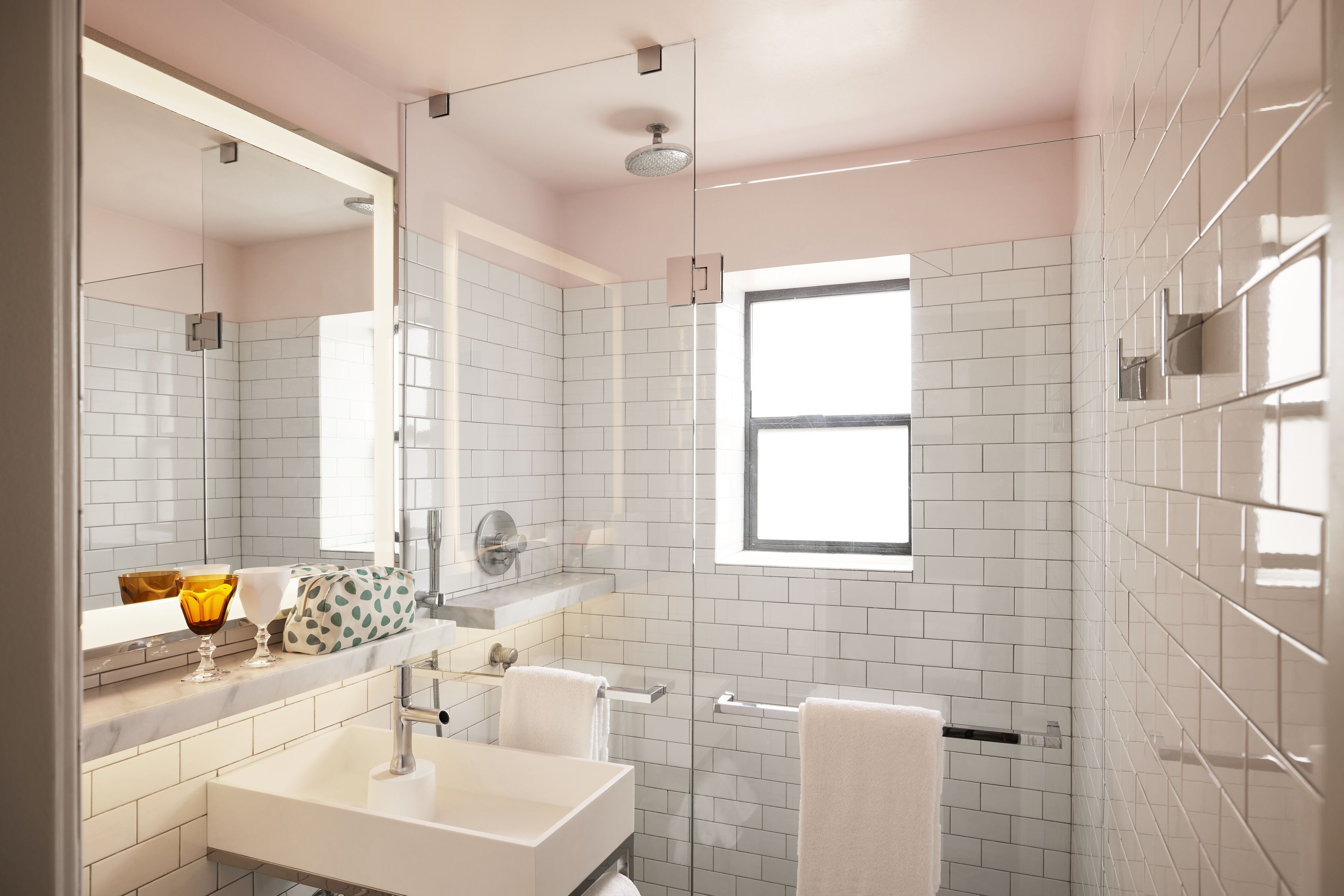 room, 1 king bed, city view (large mama) | bathroom | shower, designer toiletries, hair dryer, towels