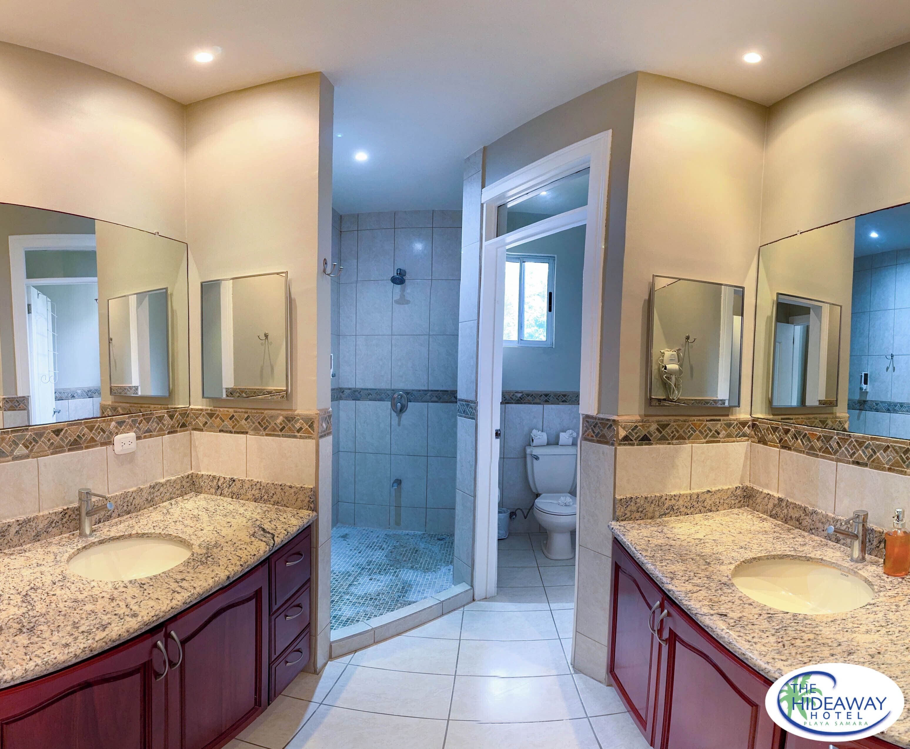 penthouse | bathroom | shower, free toiletries, hair dryer, towels