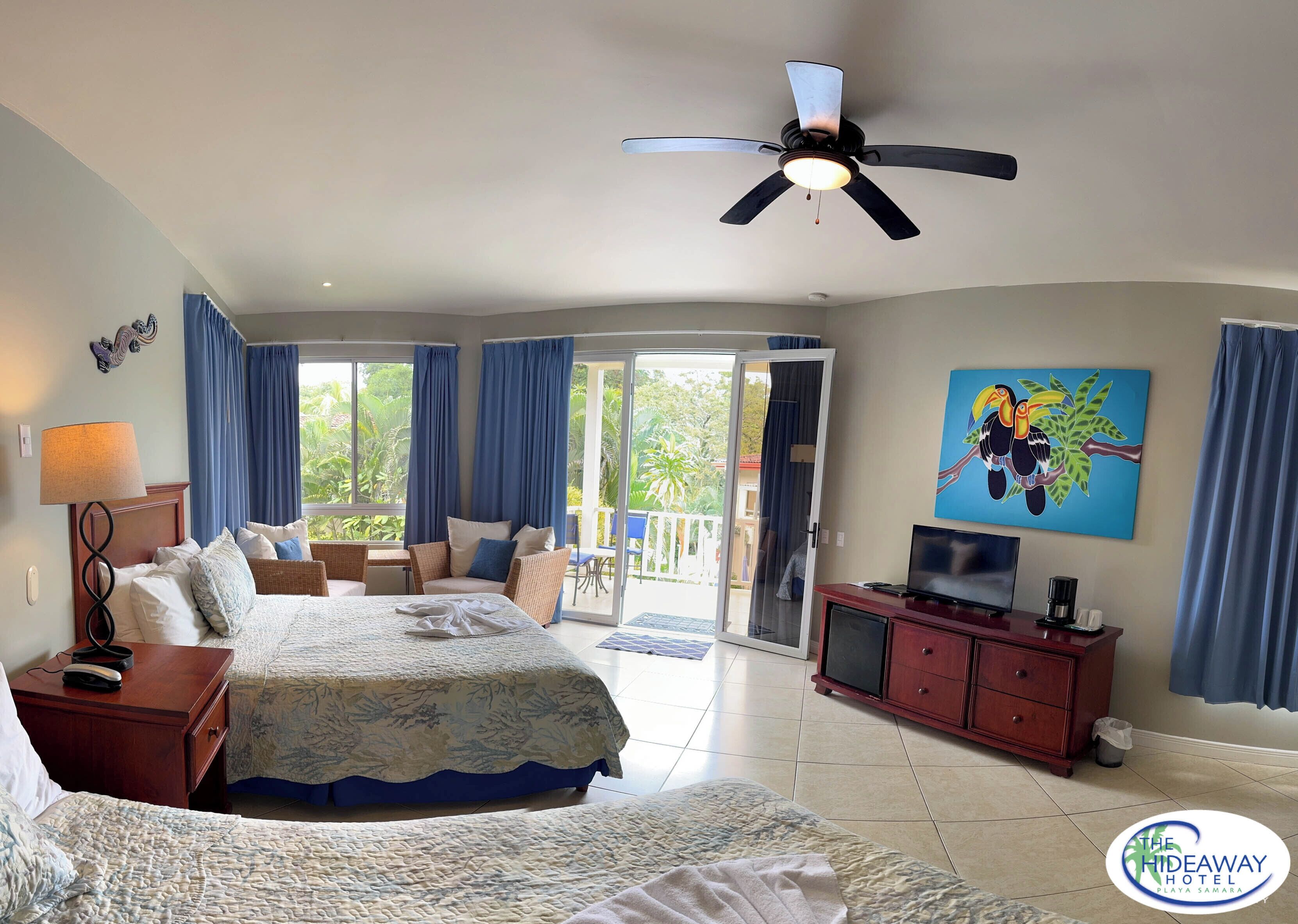 deluxe room, 2 queen beds | in-room safe, blackout curtains, soundproofing, iron/ironing board