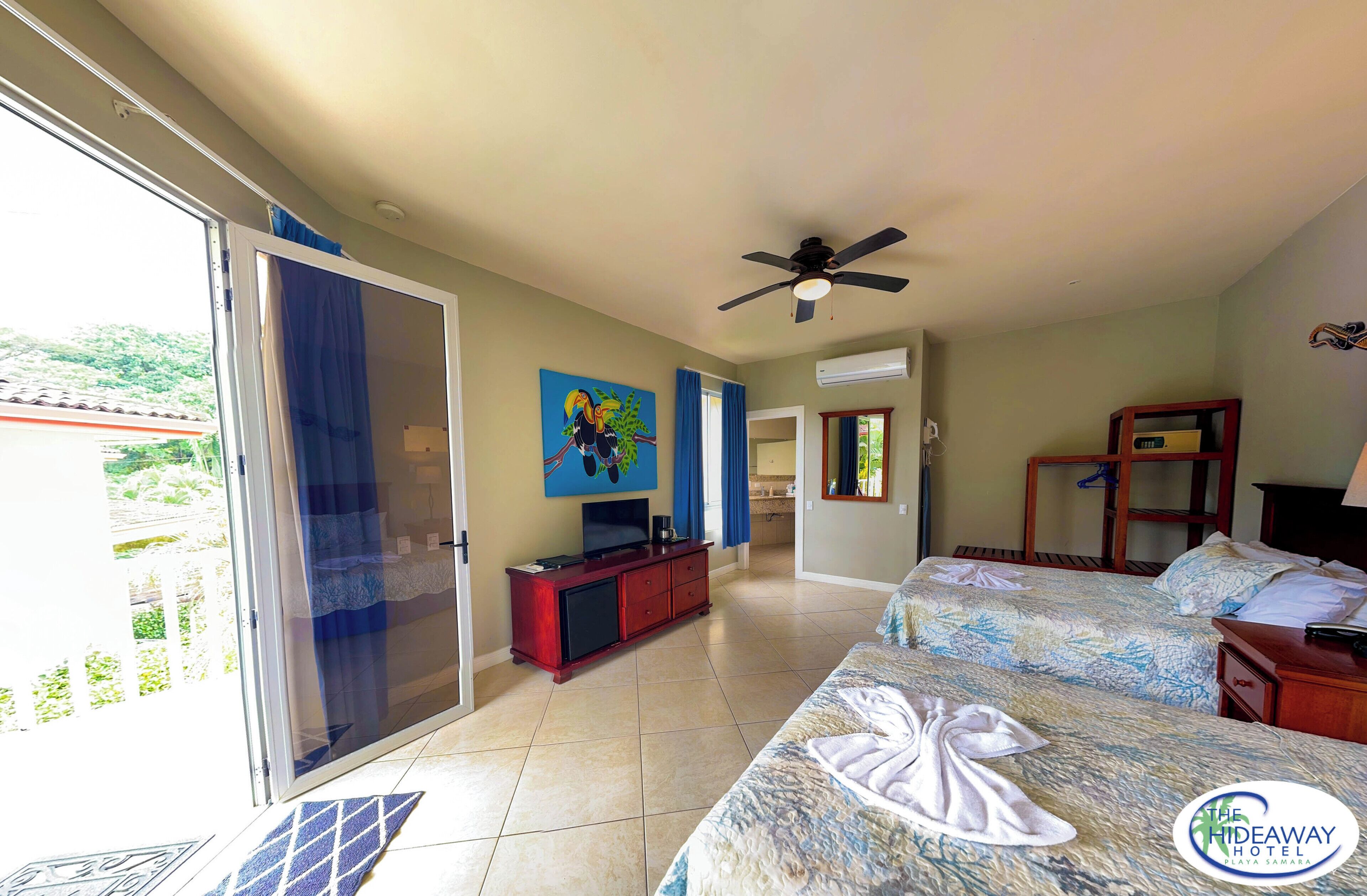 deluxe room, 2 queen beds | in-room safe, blackout curtains, soundproofing, iron/ironing board